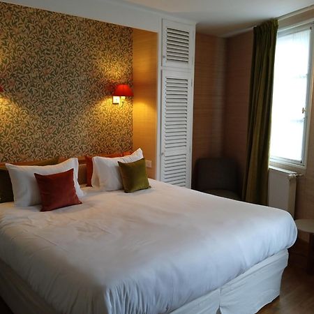 Logis Hotel Les Fuchsias Сен-Вааст-ла-Уг Экстерьер фото